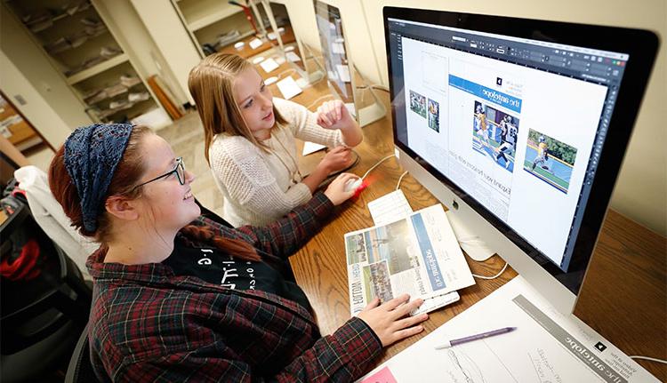 Students working on antelope newspaper